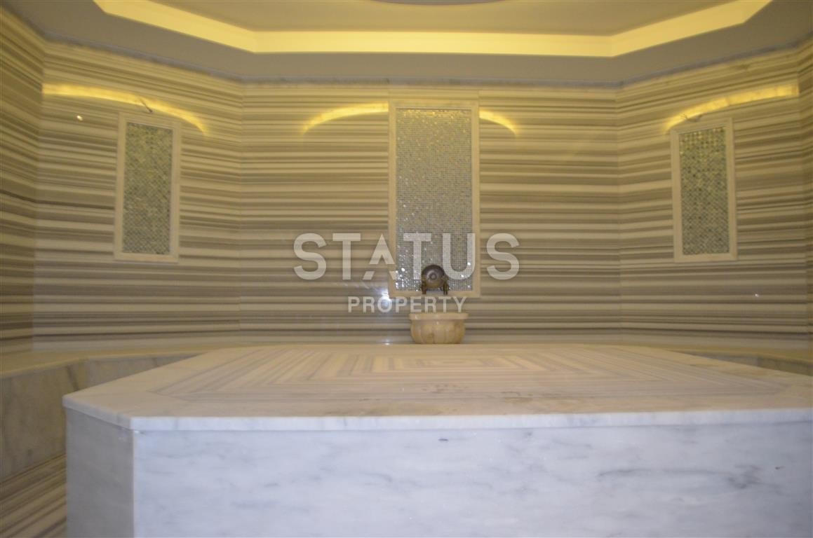 Новая четырехкомнатная квартира в элитном комплексе в центре Алании, 140 кв.м. фото 28