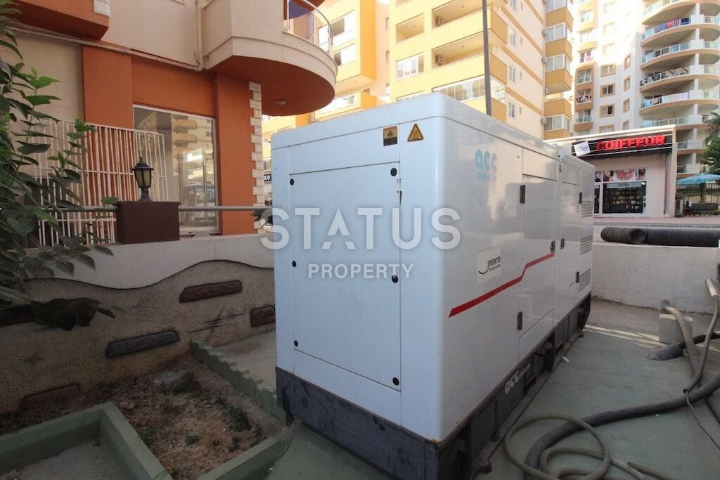 Квартира в новом доме в Махмутларе по улице Ататюрка 65 кв.м. фото 8