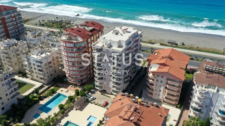 Просторные апартаменты 2+1 на первой береговой линии, 130 м2. Махмутлар, Алания. фото 1