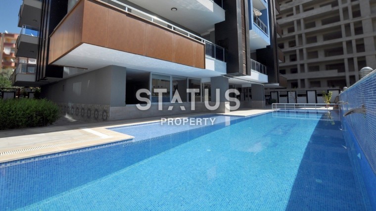 Просторная двухкомнатная квартира 70 кв.м. в нескольких шагах от моря. Махмутлар, Алания. фото 1