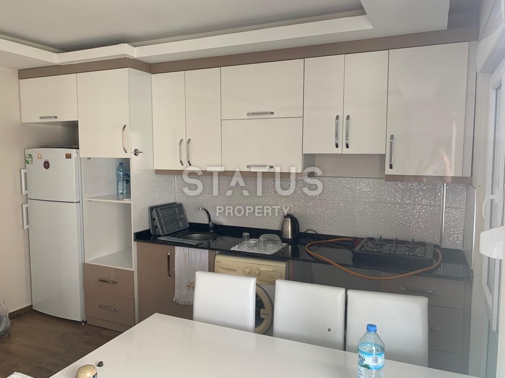 Просторная квартира 1+1 с мебелью 70 м2, в 200 метрах от моря в Махмутларе. фото 6