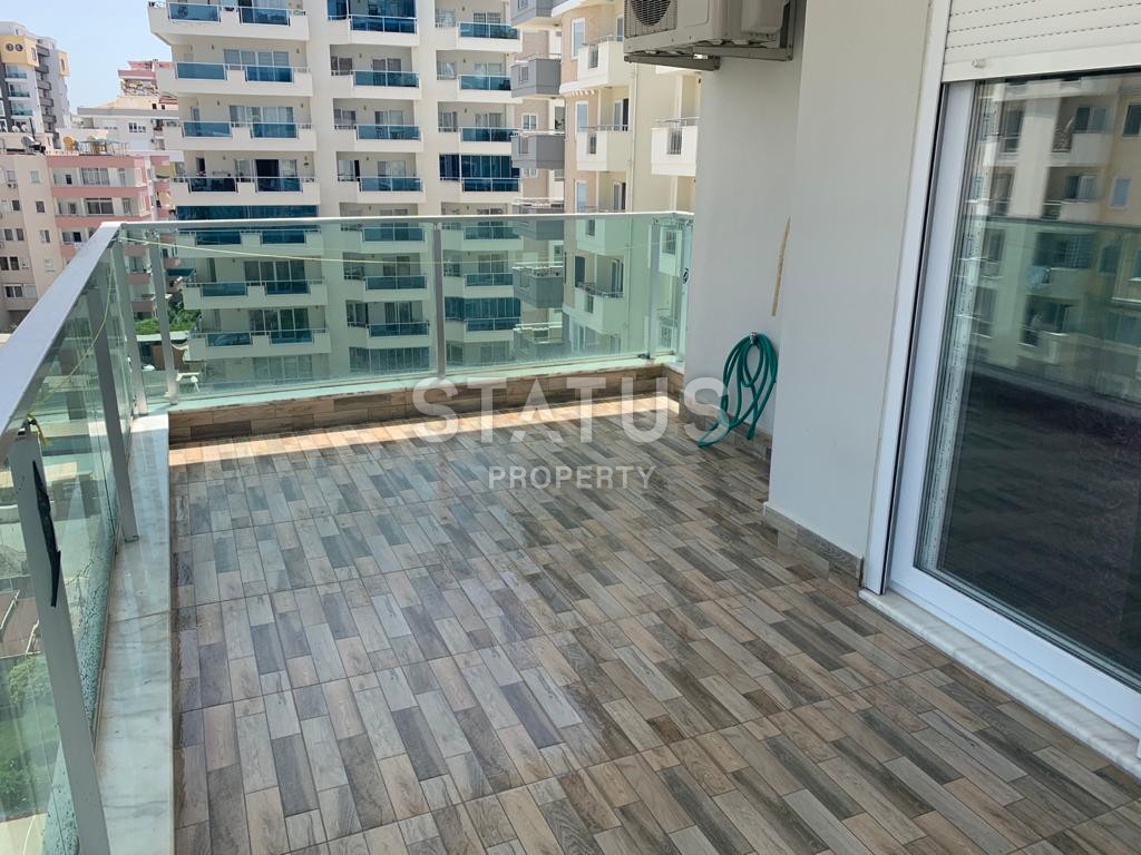 Просторная квартира 1+1 с мебелью 70 м2, в 200 метрах от моря в Махмутларе. фото 10