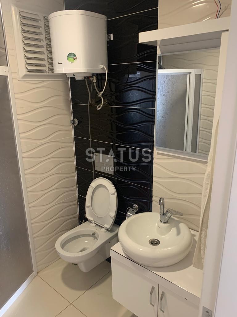 Просторная квартира 1+1 с мебелью 70 м2, в 200 метрах от моря в Махмутларе. фото 14