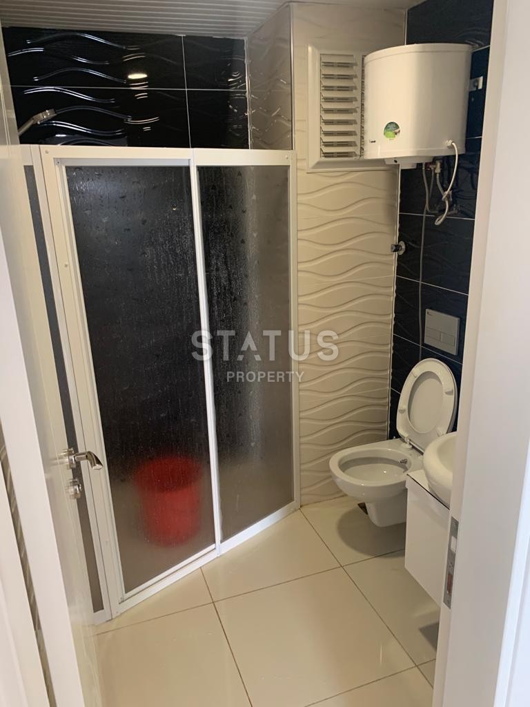 Просторная квартира 1+1 с мебелью 70 м2, в 200 метрах от моря в Махмутларе. фото 15