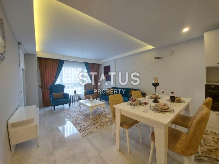 Просторная меблированная квартира планировки 1+1, 75 м2 в районе Махмутлар, Аланья фото 1