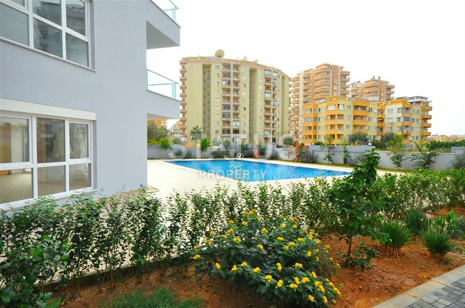 Просторная меблированная квартира планировки 1+1, 75 м2 в районе Махмутлар, Аланья фото 25