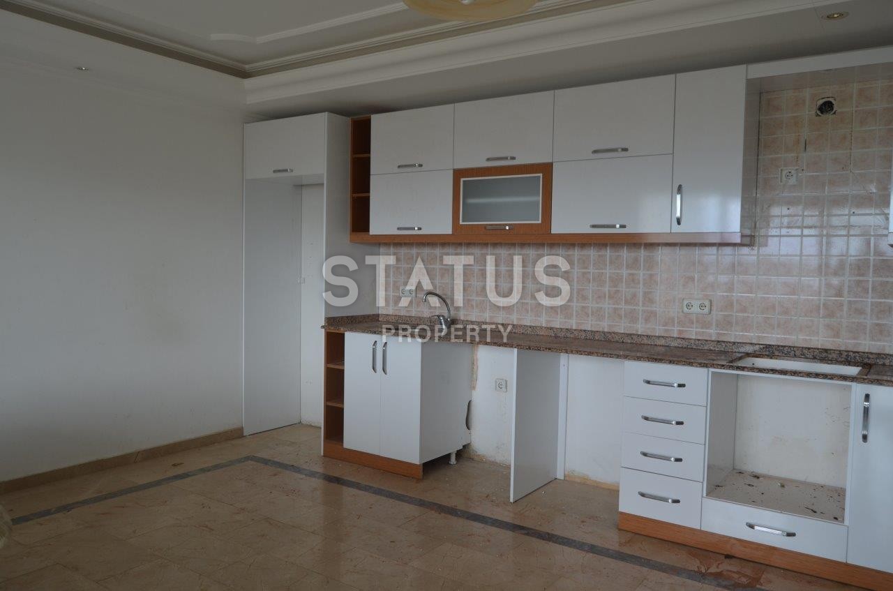 Отличная цена! Трехкомнатная квартира в районе Махмутлар, 115 кв.м. фото 3