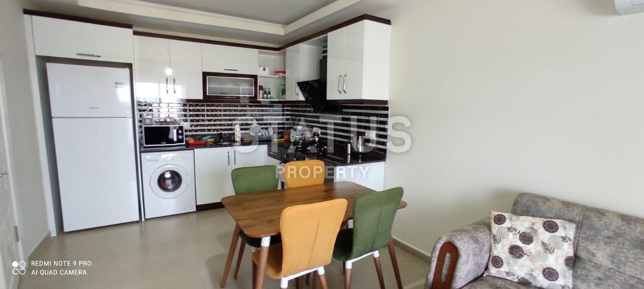 Квартира 55 кв.м. планировки 1+1 с видом на море в Махмутларе. фото 4