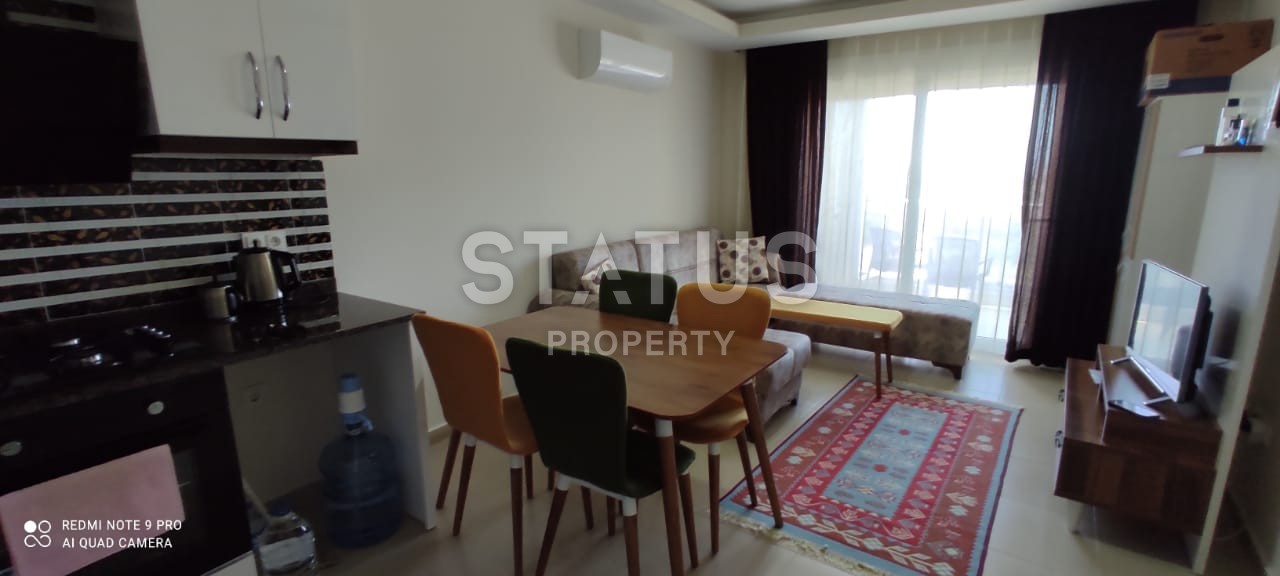 Квартира 55 кв.м. планировки 1+1 с видом на море в Махмутларе. фото 5