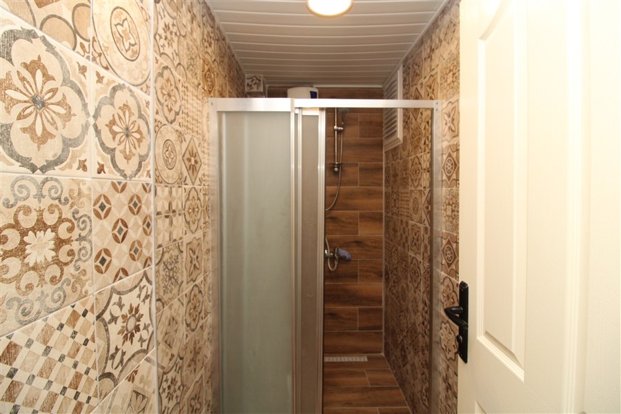 Квартира 2+1 с ремонтом в Махмутларе, 90 м2 фото 17