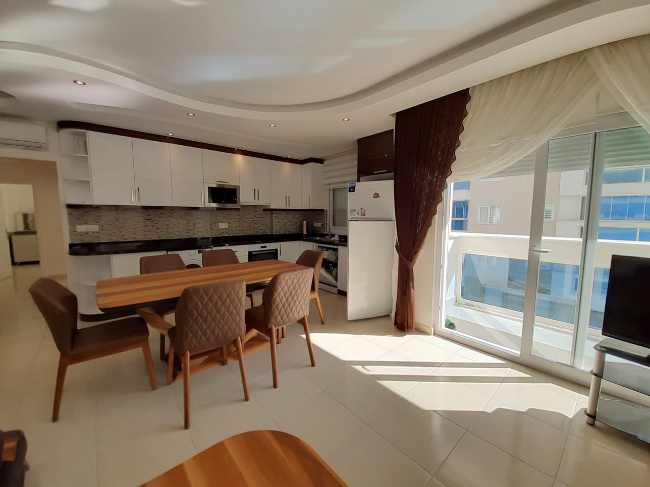 Меблированные апартаменты 2+1 в элитном новом комплексе в Махмутларе, 120 м2. фото 4