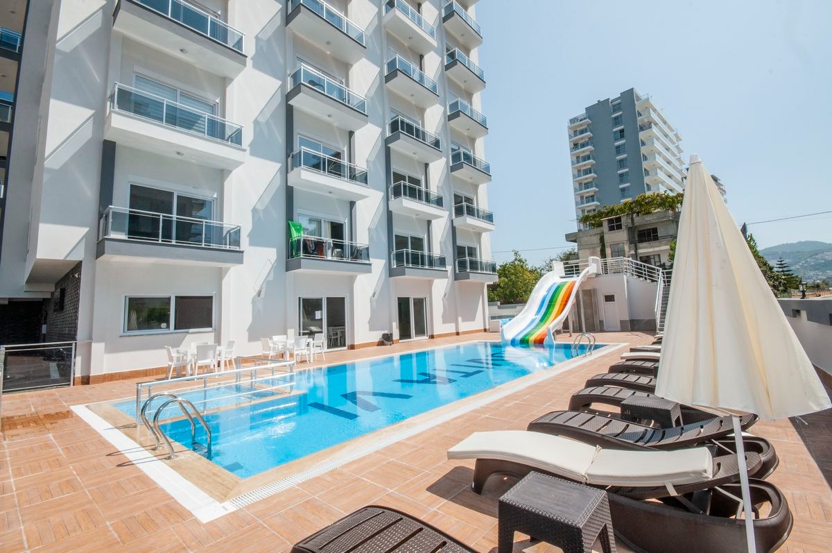 Квартира 1+1 в новом комплексе недалеко от моря, 50 м2. Махмутлар, Алания. фото 1