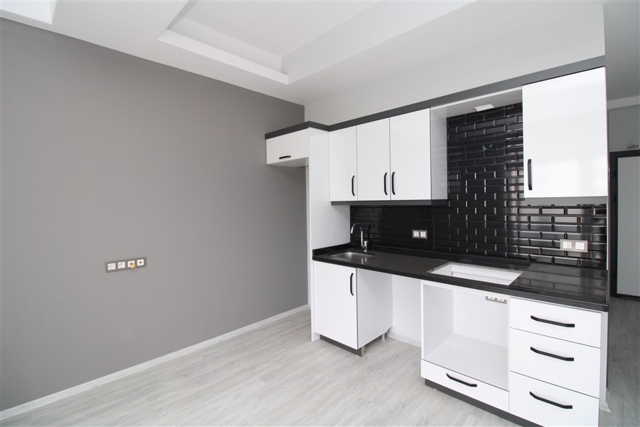 Квартира 1+1 в новом комплексе недалеко от моря, 50 м2. Махмутлар, Алания. фото 4