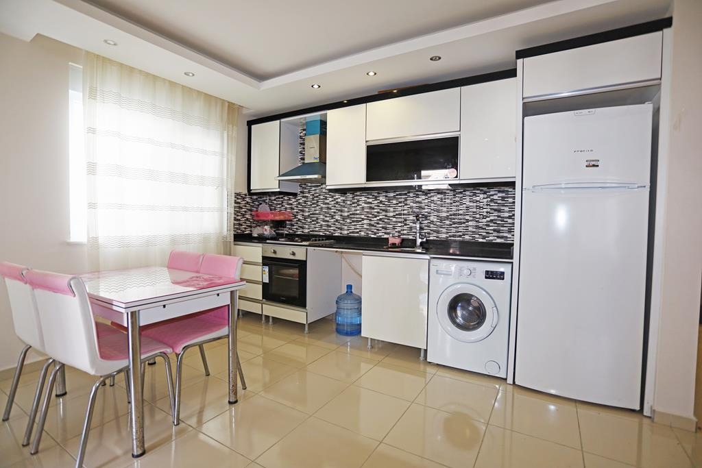 Квартира планировки 1+1 с большой площадью, 75 м2 в районе Махмутлар, Аланья фото 11