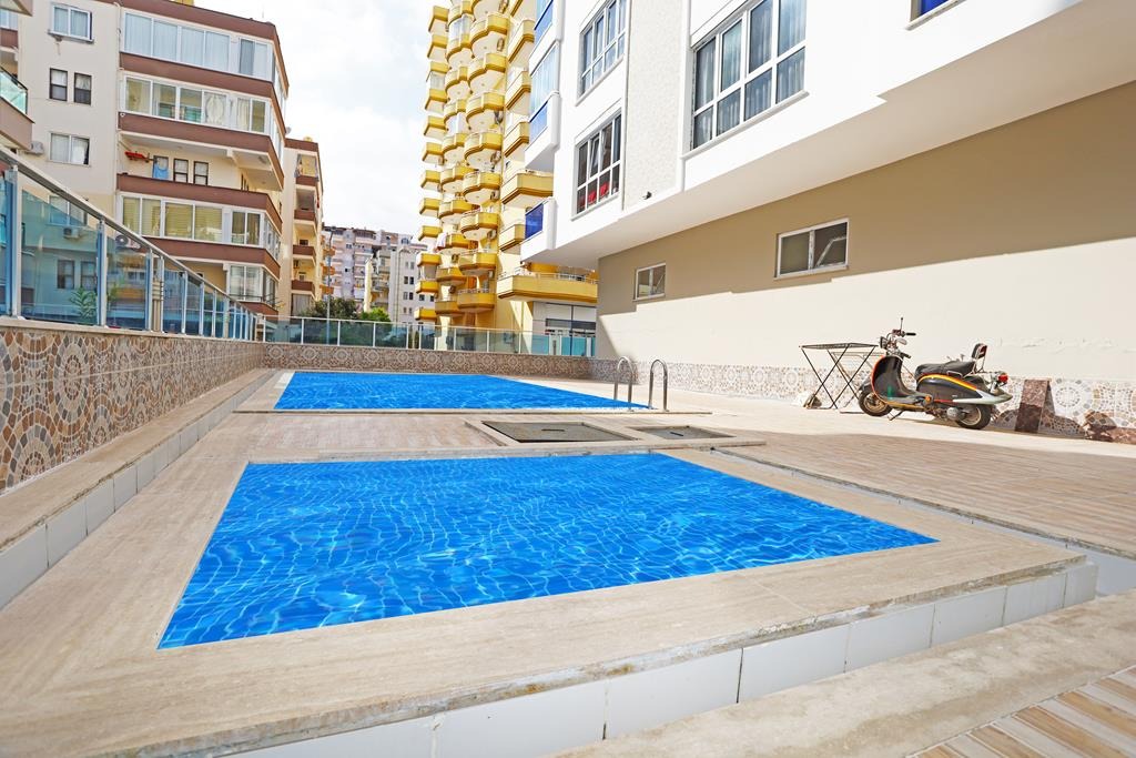 Квартира планировки 1+1 с большой площадью, 75 м2 в районе Махмутлар, Аланья фото 16