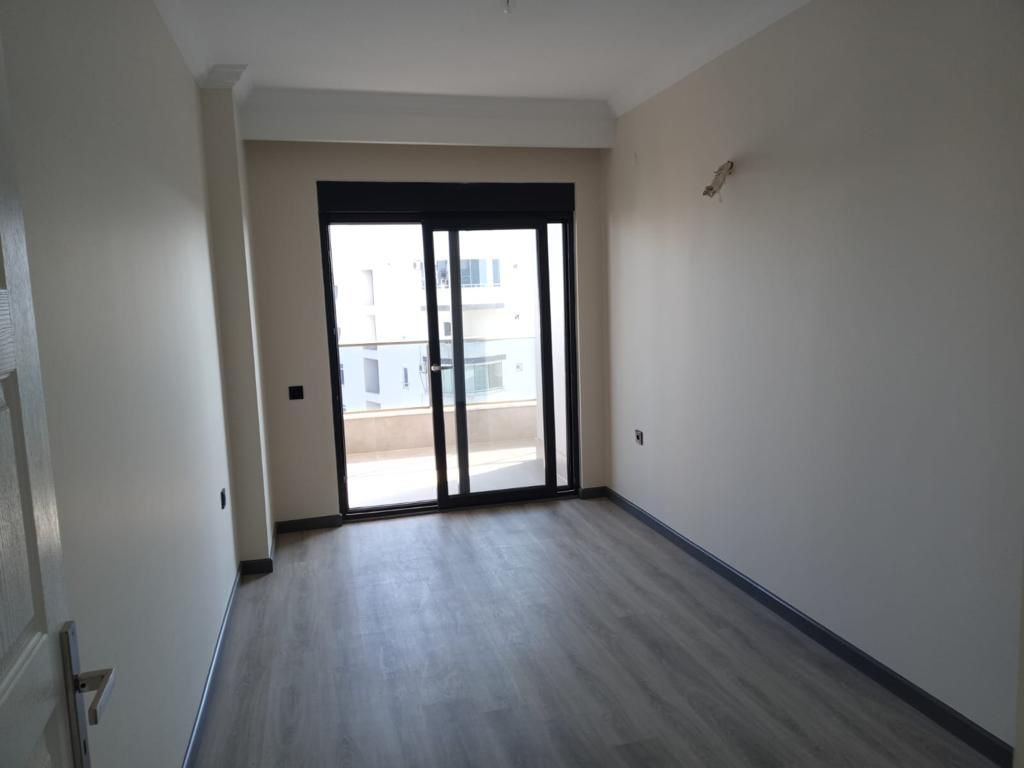 Две квартиры 2+1 в элитном новом комплексе в Махмутларе, 100 м2. фото 29