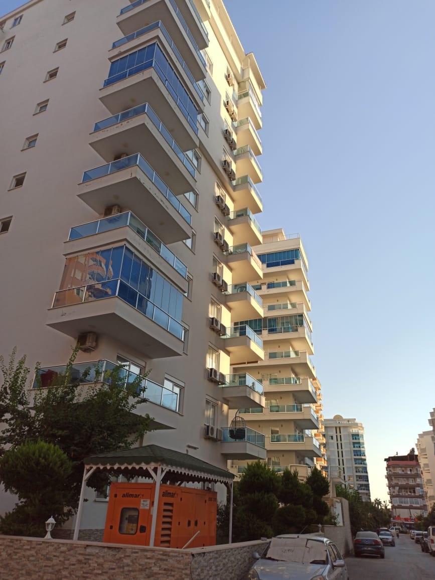 Большая двухкомнатная квартира 70м2, с частичным видом на море в центральной части Махмутлара. фото 5