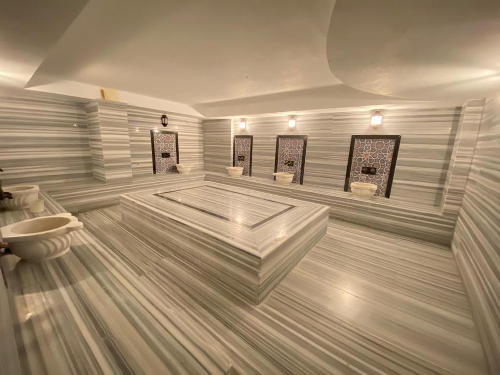 Большая двухкомнатная квартира 70м2, с частичным видом на море в центральной части Махмутлара. фото 12