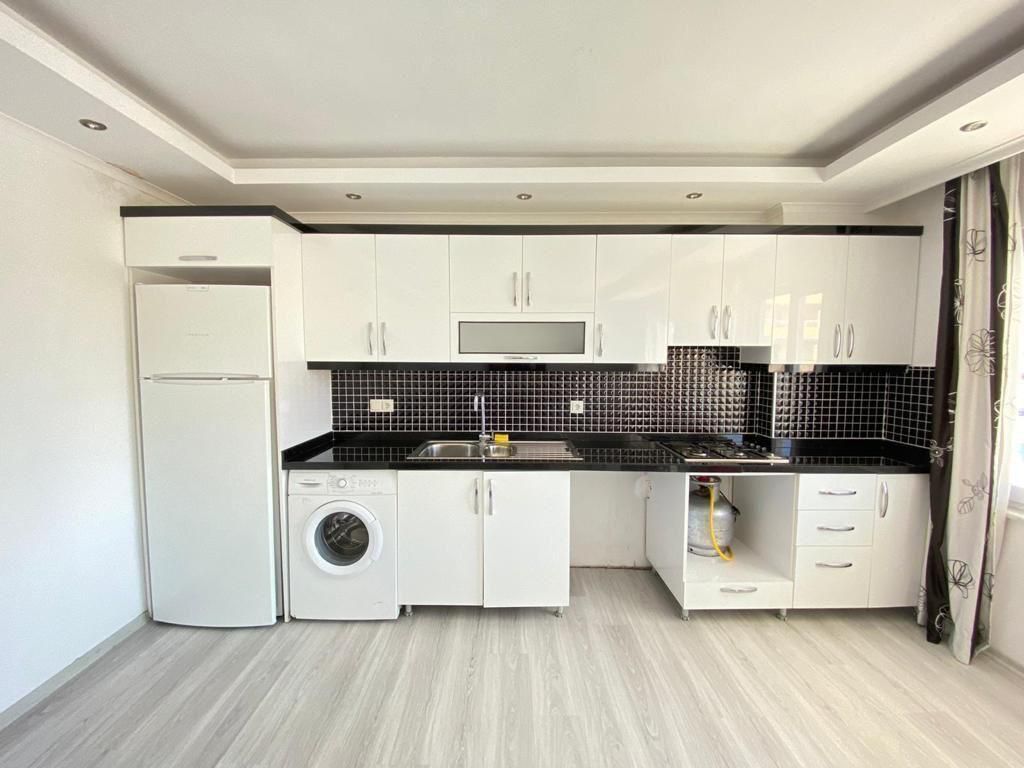 Большая двухкомнатная квартира 70м2, с частичным видом на море в центральной части Махмутлара. фото 14