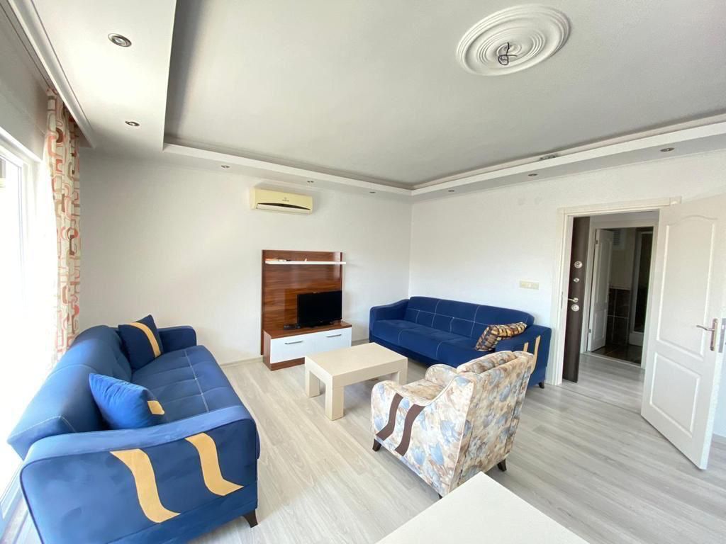 Большая двухкомнатная квартира 70м2, с частичным видом на море в центральной части Махмутлара. фото 15