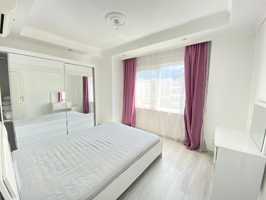 Большая двухкомнатная квартира 70м2, с частичным видом на море в центральной части Махмутлара. фото 18