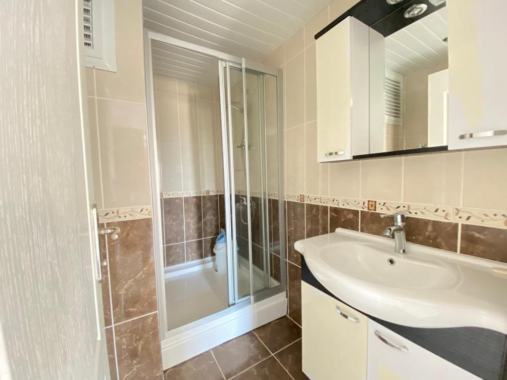 Большая двухкомнатная квартира 70м2, с частичным видом на море в центральной части Махмутлара. фото 20