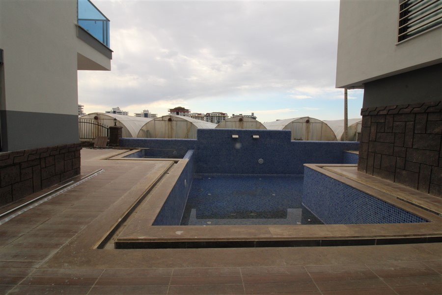 Apartment 1+1 in a new complex in Mahmutlar, 50 m2 фото 11