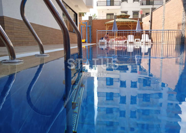 Две квартиры 1+1 в новом комплексе, 55 м2. Махмутлар, Алания. фото 1