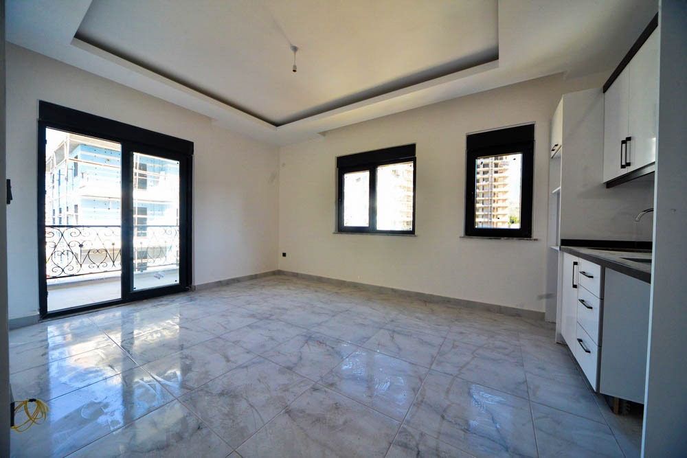 Две квартиры 1+1 в новом комплексе, 55 м2. Махмутлар, Алания. фото 50