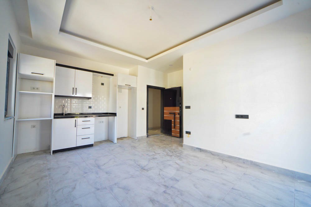 Две квартиры 1+1 в новом комплексе, 55 м2. Махмутлар, Алания. фото 51