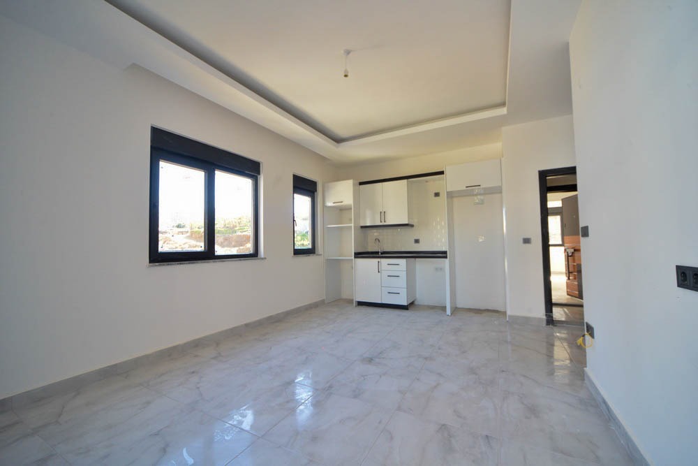 Две квартиры 1+1 в новом комплексе, 55 м2. Махмутлар, Алания. фото 53