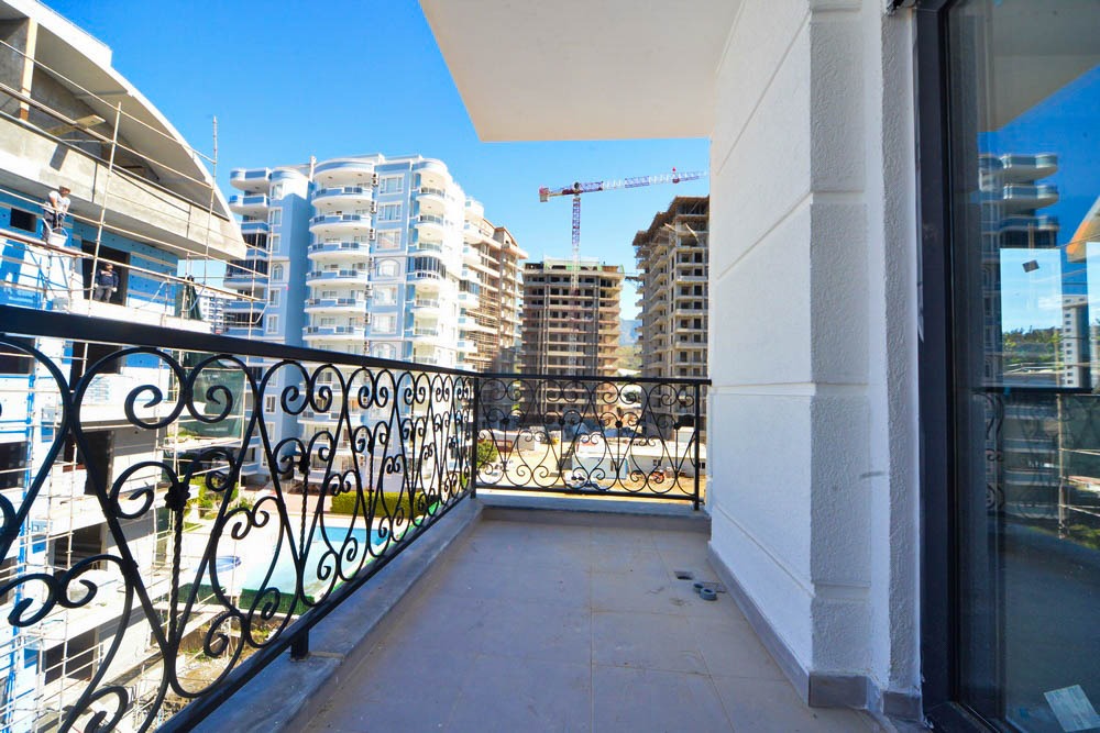 Две квартиры 1+1 в новом комплексе, 55 м2. Махмутлар, Алания. фото 55