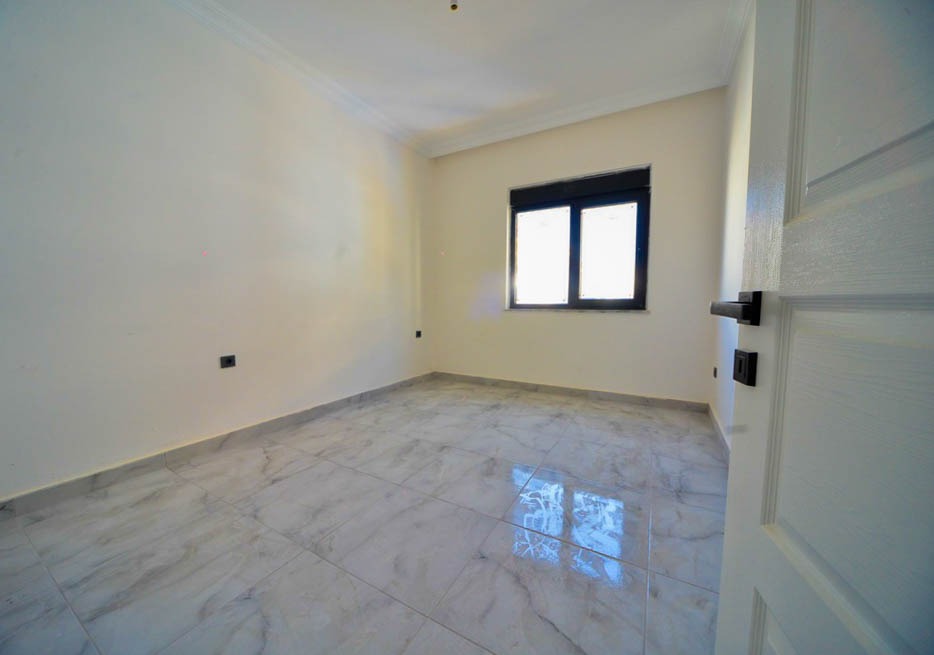 Две квартиры 1+1 в новом комплексе, 55 м2. Махмутлар, Алания. фото 57