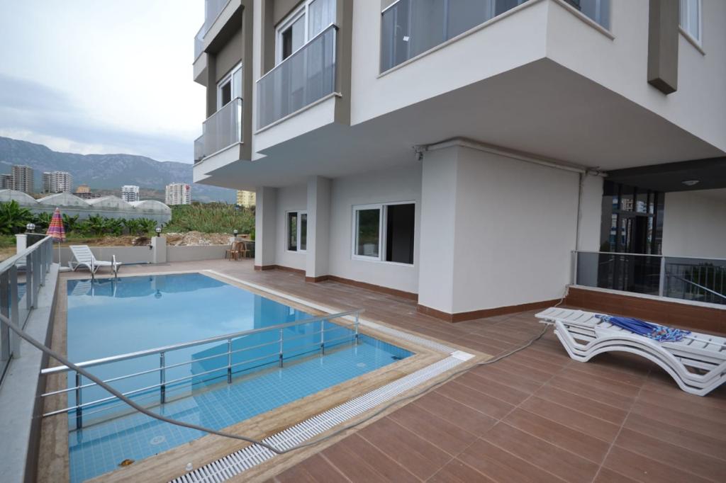 Новая квартира 1+1 с мебелью в Махмутларе, 50 м2 фото 1