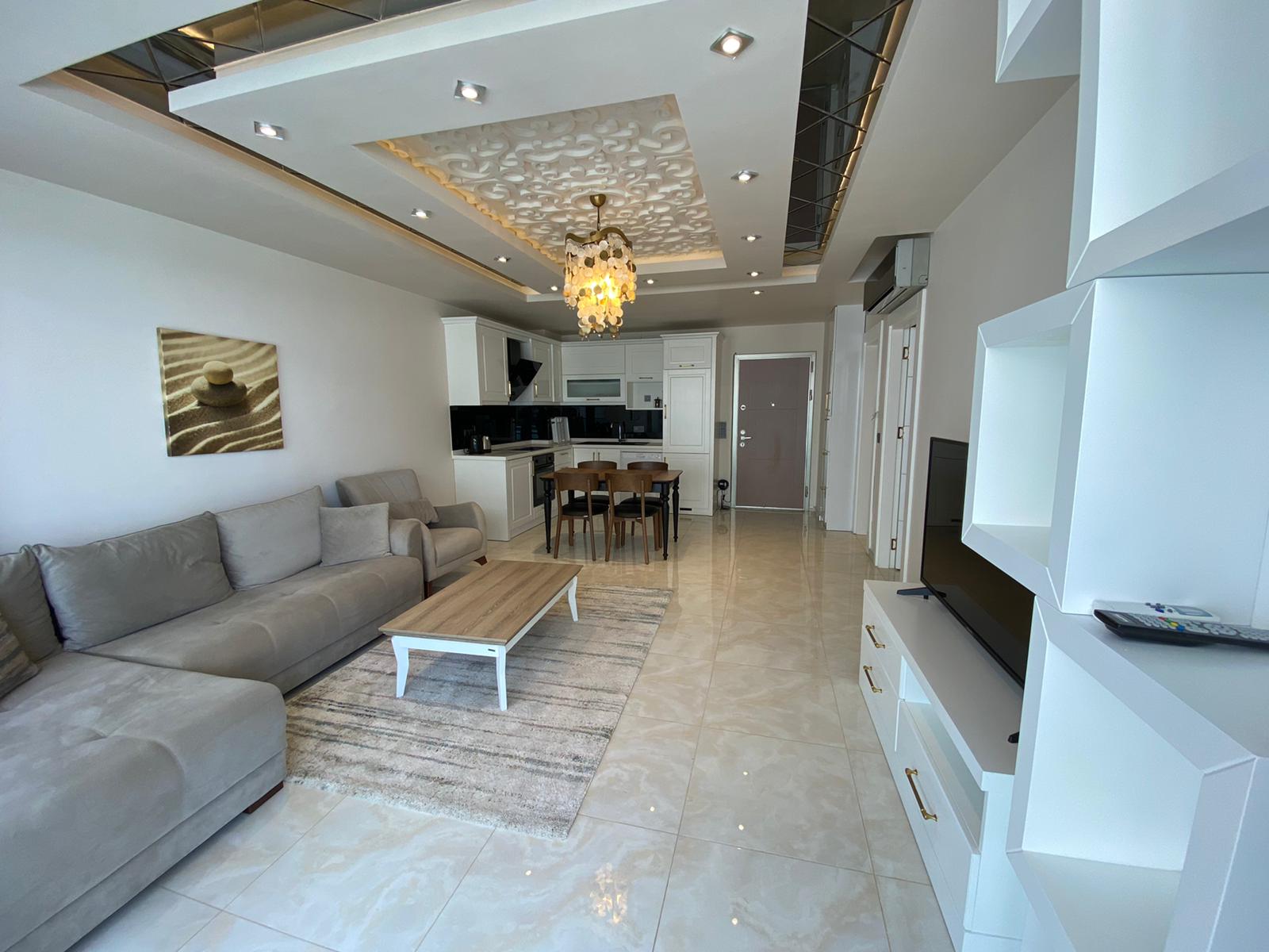 Квартира 1+1 с новой мебелью и боковыми видами на море и горы, в Махмутларе. 65кв.м. фото 5