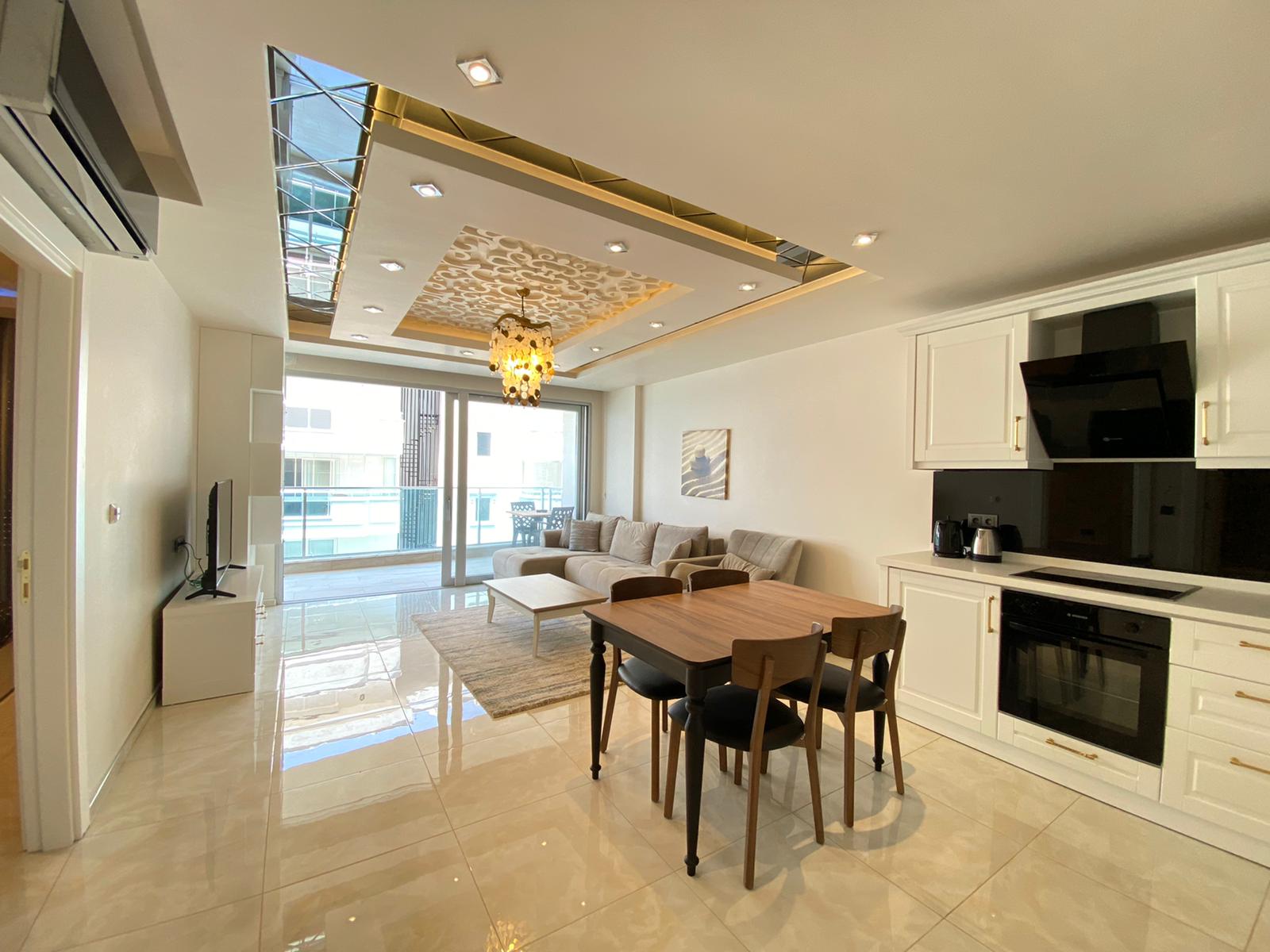 Квартира 1+1 с новой мебелью и боковыми видами на море и горы, в Махмутларе. 65кв.м. фото 6