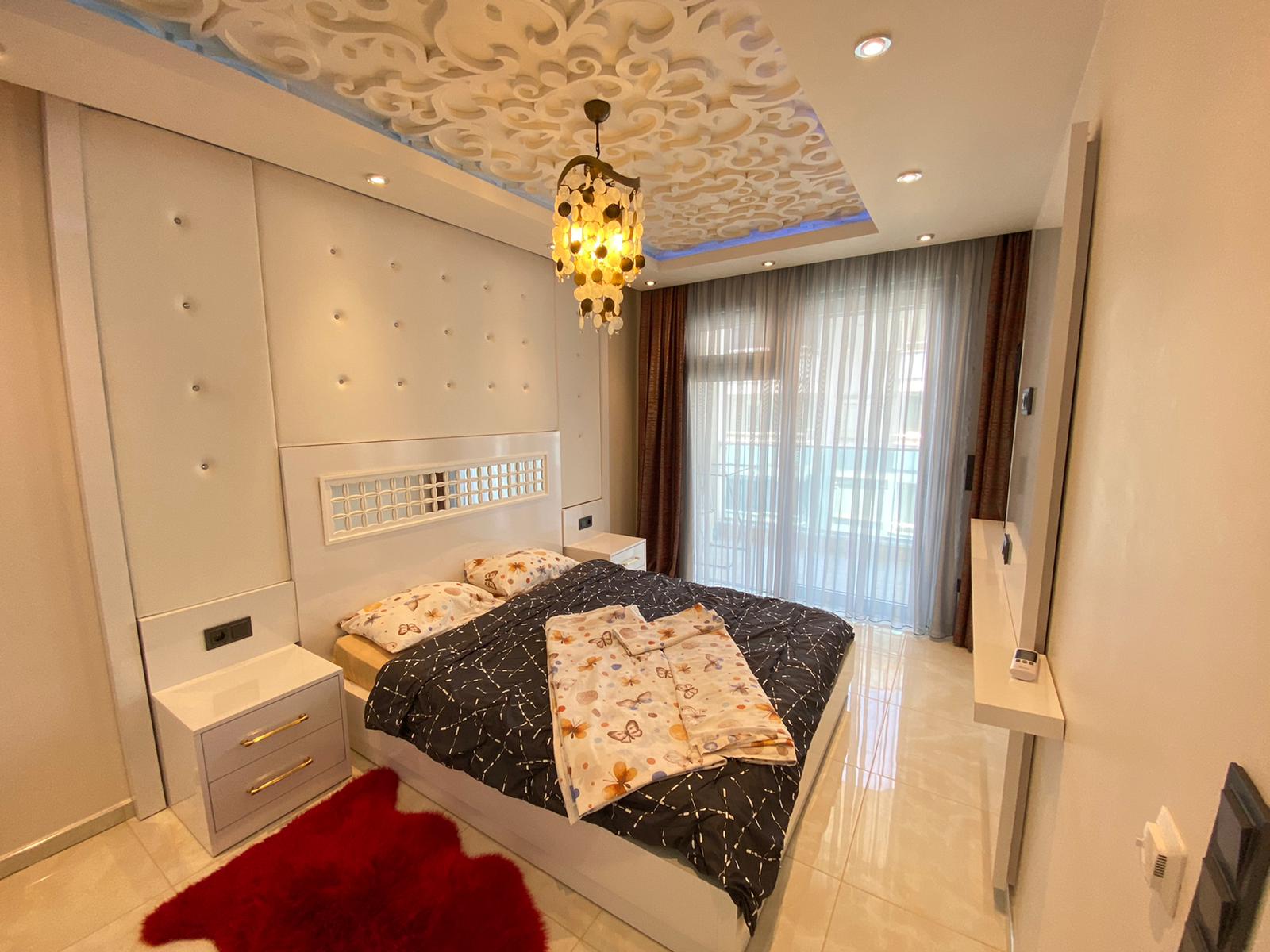 Квартира 1+1 с новой мебелью и боковыми видами на море и горы, в Махмутларе. 65кв.м. фото 10