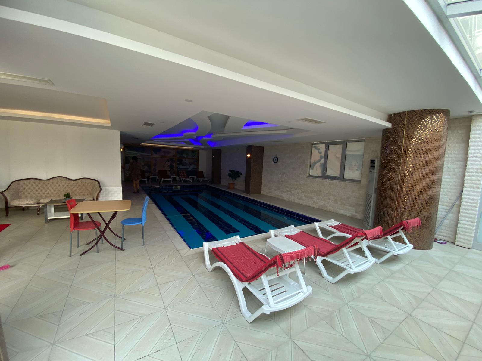 Квартира 1+1 с новой мебелью и боковыми видами на море и горы, в Махмутларе. 65кв.м. фото 12