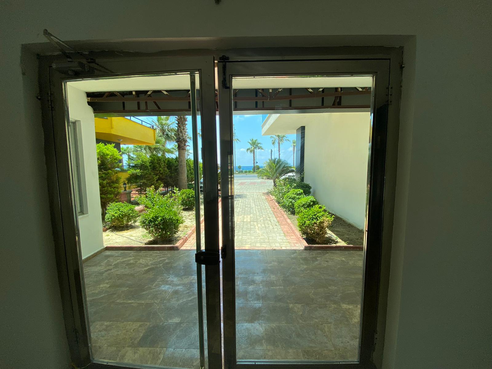 Квартира 1+1 с новой мебелью и боковыми видами на море и горы, в Махмутларе. 65кв.м. фото 14