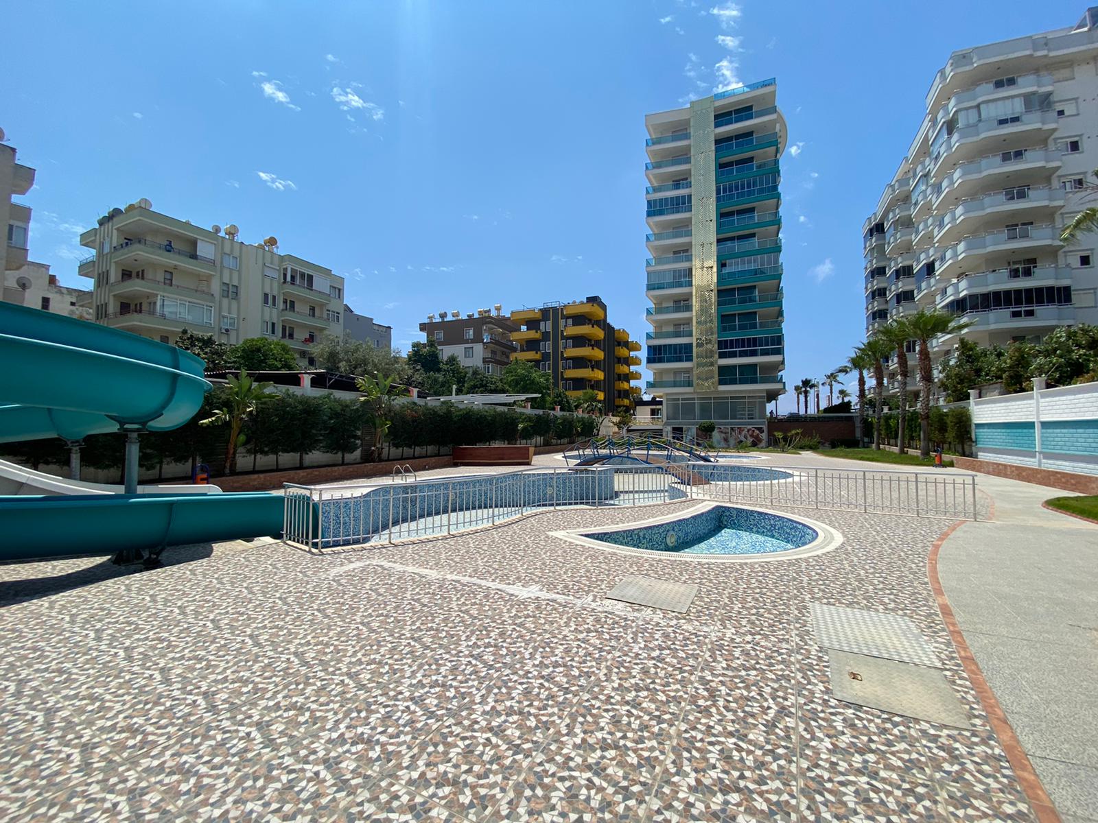 Квартира 1+1 с новой мебелью и боковыми видами на море и горы, в Махмутларе. 65кв.м. фото 15