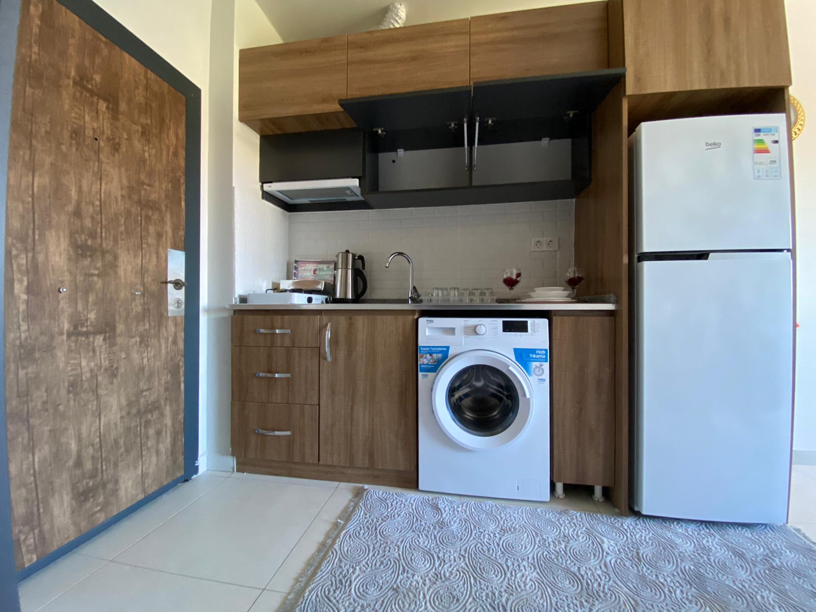 Двухкомнатная квартира с видом на старый город Наула в Махмутларе, 50 м2 фото 8