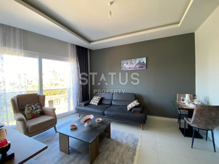 Двухкомнатная квартира с видом на старый город Наула в Махмутларе, 50 м2 фото 1