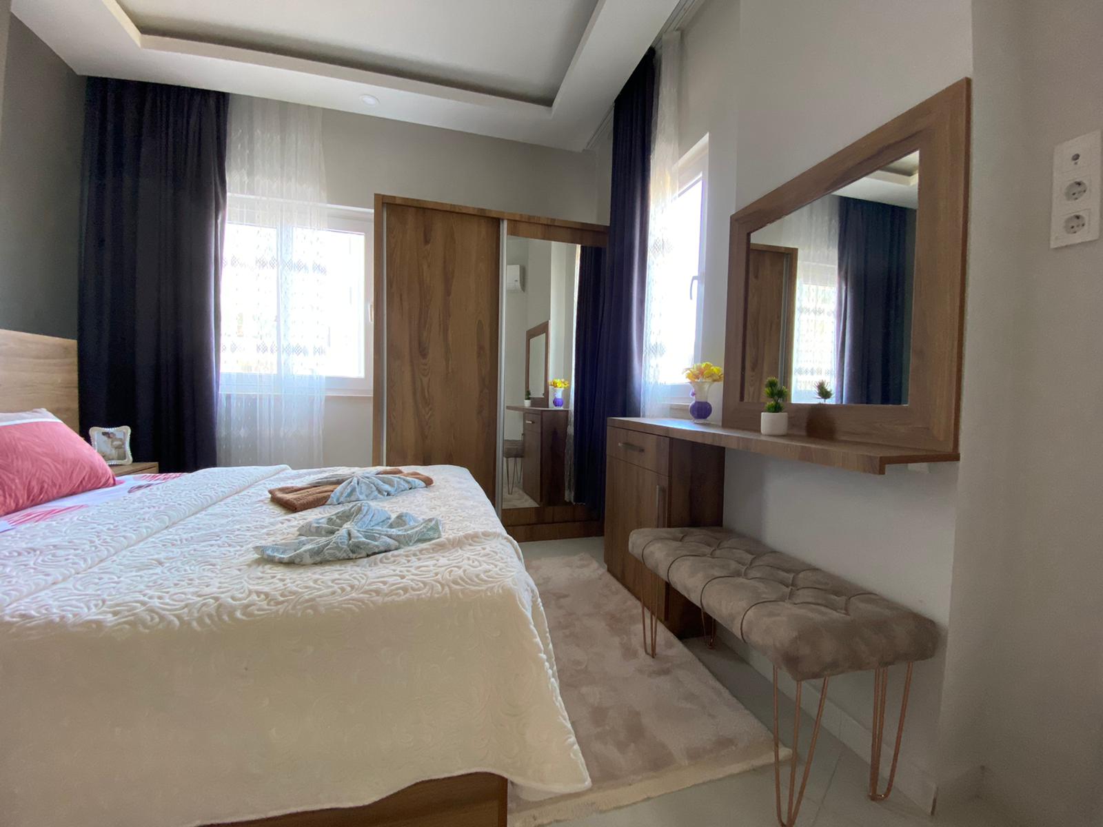 Двухкомнатная квартира с видом на старый город Наула в Махмутларе, 50 м2 фото 12