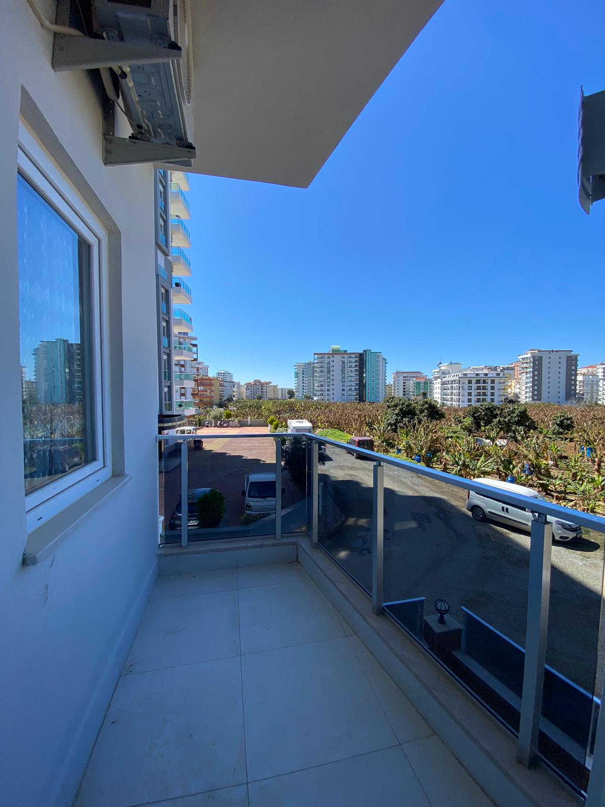 Двухкомнатная квартира с видом на старый город Наула в Махмутларе, 50 м2 фото 16