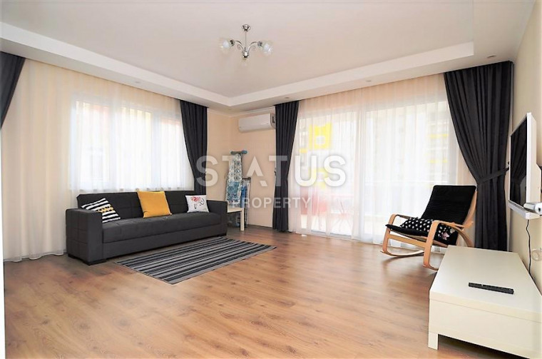 Просторная квартира 2+1 с отдельной кухней в новом доме, всего в 300 метрах от пляжа в Махмутларе, 115 м2. фото 1