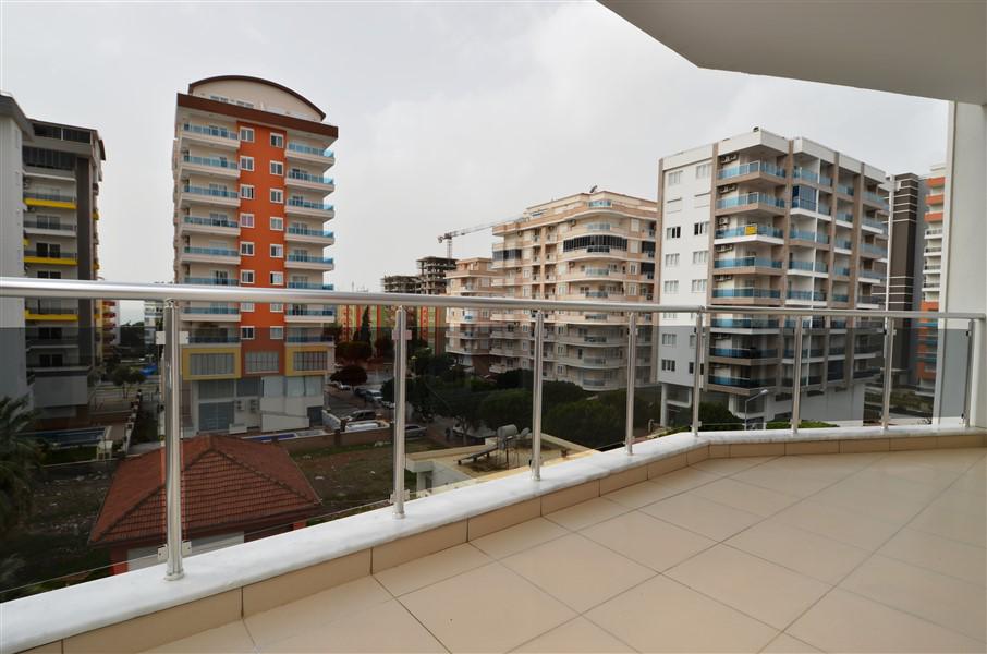 Spacious apartment 2+1 with a separate kitchen in a new building, just 300 meters from the beach in Mahmutlar, 115 m2. фото 4