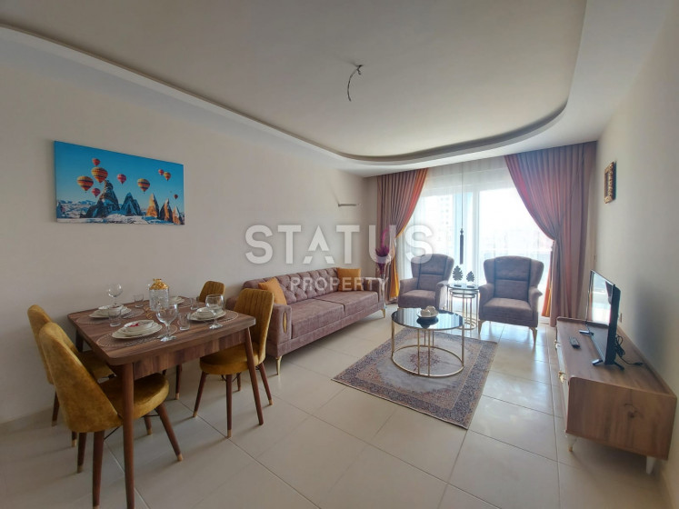 Квартира 1+1 с мебелью в Махмутларе, 68 кв.м. фото 1