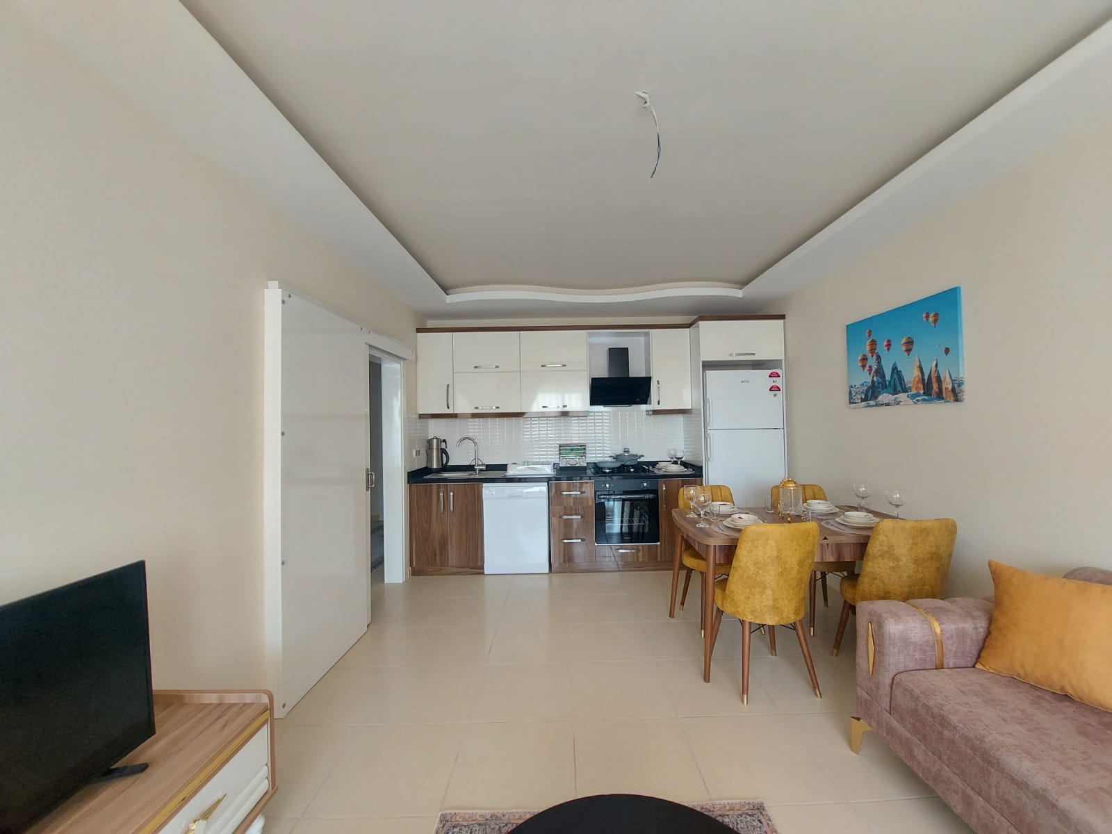 Квартира 1+1 с мебелью в Махмутларе, 68 кв.м. фото 4