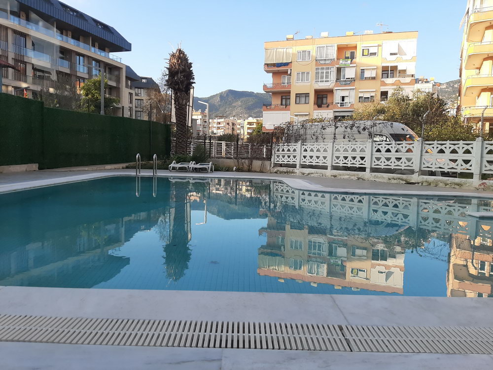 Новый модный комплекс с эксклюзивной локацией в самом центре Алании.Квартиры разных планировок от 55 м2. фото 14