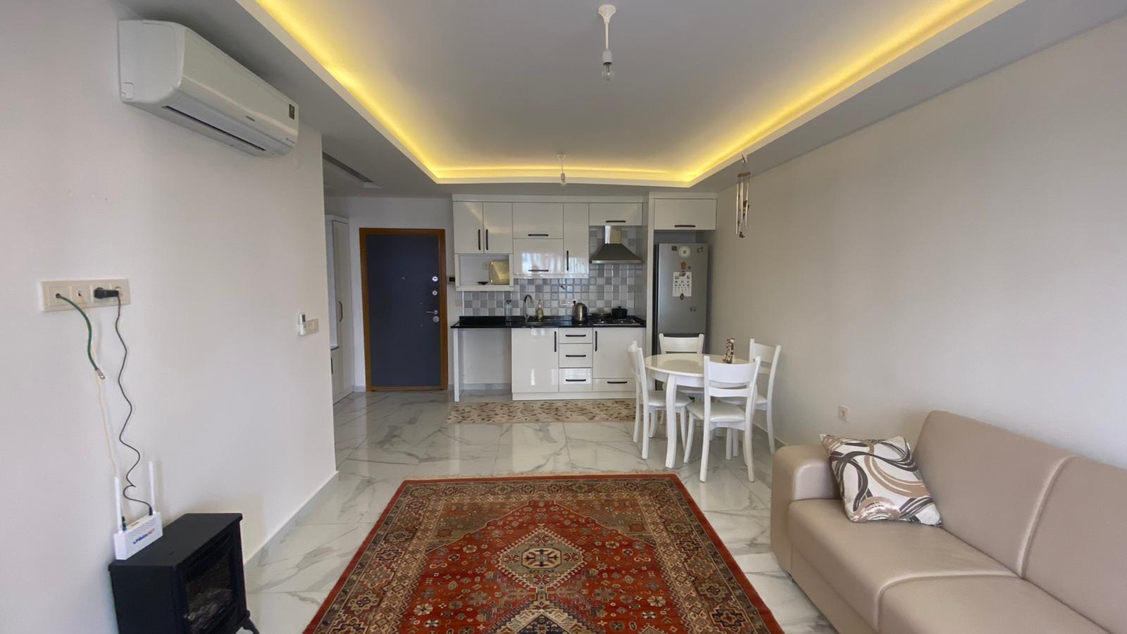 Двухкомнатная квартира в 200 метрах от моря в Махмутларе, 70 кв.м. фото 10